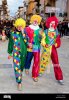 three-men-dressed-up-as-clowns-carnival-on-shrove-tuesday-balestrate-BEDD7J.jpg