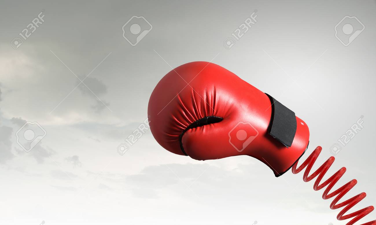 56275276-boxing-glove-on-spring-as-suddenness-concept.jpg